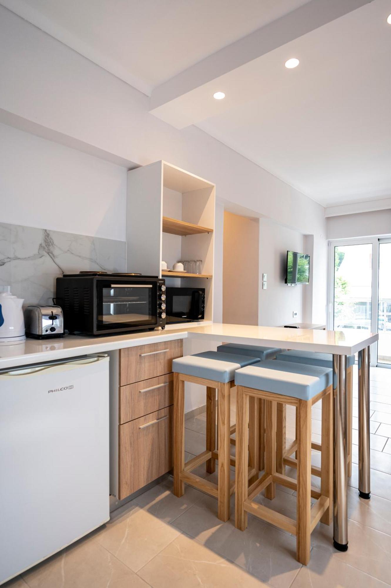 Poseidon Deluxe Apartments คอสทาวน์ ภายนอก รูปภาพ